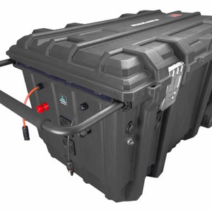 May include: A black, heavy-duty storage container with a built-in handle and wheels. The container has a red label that says "Remarkable".