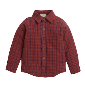 May include: A red and blue plaid long-sleeve button-down shirt.