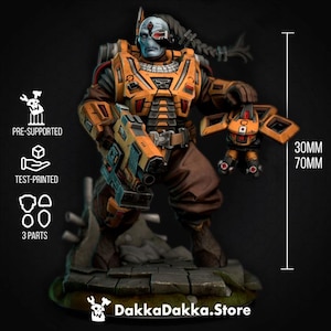 May include: A detailed figurine of a futuristic warrior, predominantly orange and brown, holding a weapon and a smaller robotic figure. The figure is approximately 7cm tall. The base is a textured gray. Text includes "PRE-SUPPORTED", "TEST-PRINTED", "3 PARTS", and "DakkaDakka.Store".