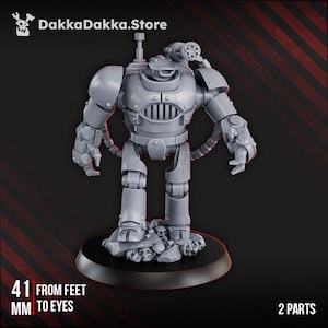 May include: A grey, two-part miniature robot figure on a circular base. The robot features a detailed design, including a head with a gun, a chest with a grill, and articulated arms and legs. The text "41 mm from feet to eyes" is visible.