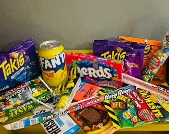 Caja misteriosa. Sorpresa americana con snacks, dulces y bebidas.