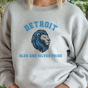 Sudadera premium de cuello redondo con orgullo azul y plateado de los Detroit Lions