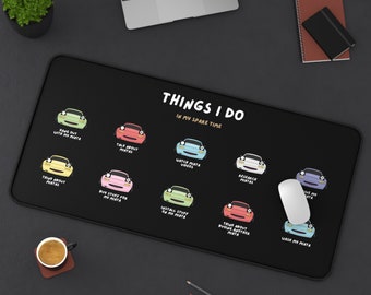 May include: A black mouse mat with a white border features a humorous illustration of a car with the text "Things I do in my spare time". The illustration shows a car with different activities, such as "Hang out with my Miata", "Talk about Miatas", "Watch Miata videos", "Research Miatas", "Buy stuff for my Miata", "Install stuff on my Miata", "Think about buying another Miata", "Wash my Miata", and "Drive my Miata".