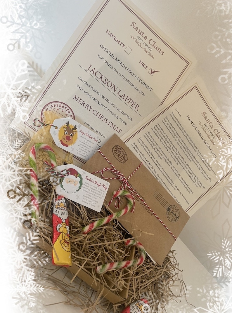 May include: A Christmas-themed gift set with a Santa Claus certificate, a letter, candy canes, and a chocolate Santa. The certificate is addressed to Jackson Lapper and states "Nice" on the official North Pole document.