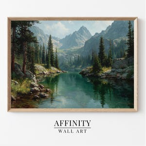May include: A framed landscape painting shows a tranquil mountain lake. The artwork features a turquoise lake surrounded by green trees and mountains under a cloudy sky. The frame is light brown. The text "AFFINITY WALL ART" is at the bottom of the image.