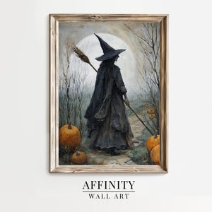 May include: A framed print depicting a witch in a black hat and cloak, walking through a forest with pumpkins. She carries a broom. The background features a full moon. The text "AFFINITY WALL ART" is at the bottom.