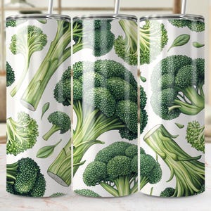 May include: Three white insulated tumblers with a repeating pattern of green broccoli florets and stems. The design features detailed watercolour illustrations of the vegetable, including individual florets and leaves.