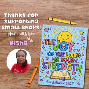 May include: A colorful crayon-style drawing on paper featuring a smiling yellow sun, a book, and the text THE JOY OF THE LORD IS YOUR STRENGTH NEHEMIAH 8:10. The image includes two crayons, a circular portrait of a person, and the text THANKS FOR SUPPORTING SMALL SHOPS! Made with love kisha.