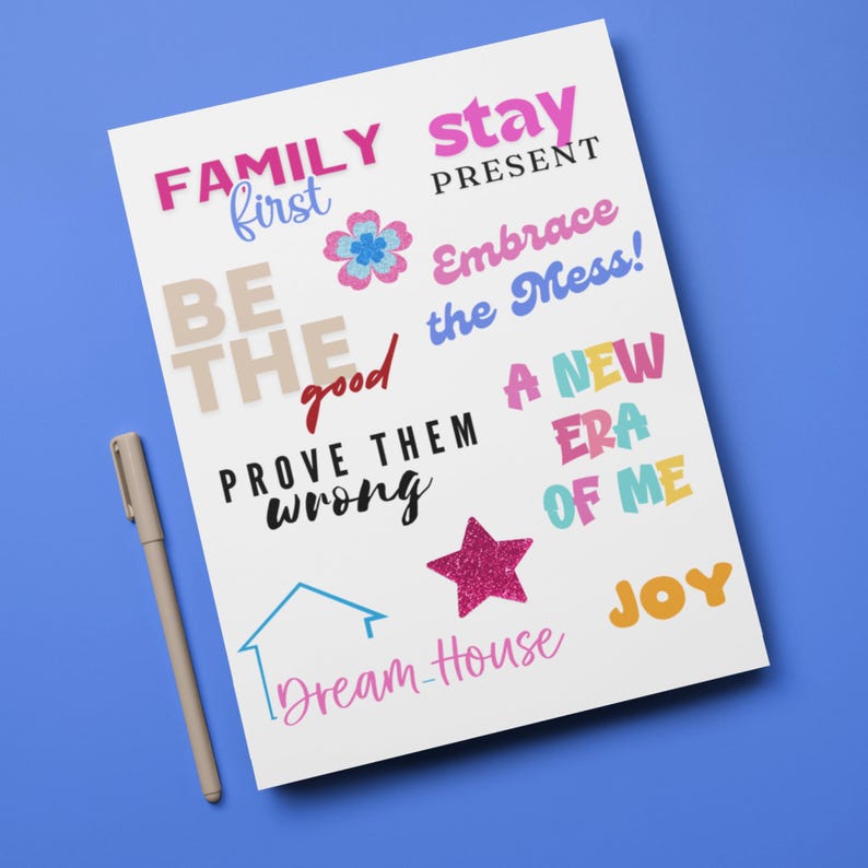 2026 Vision Board Words printable sheet on a blue background with motivational quotes such as Family First, Stay Present, Embrace the Mess, A New Era of Me, Prove Them Wrong, Dream House, and Joy. Includes colorful typography and positive affirmations for goal setting and New Year vision board projects.