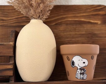 Snoopy Wach auf und rieche die Kaffeekanne