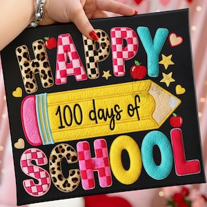 May include: Black canvas sign with the words "HAPPY 100 days of SCHOOL" in various colours and patterns. The design includes a yellow pencil, red apples, hearts, and stars. The letters have leopard print, checkered, and solid colour designs.