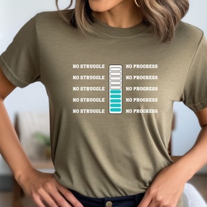 May include: A green t-shirt with the text "NO STRUGGLE" and "NO PROGRESS" repeated five times. Each line of text is paired with a progress bar that is filled in with turquoise. The progress bars are all empty except for the last one, which is completely filled in.