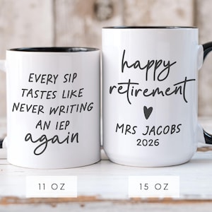 May include: Two white ceramic mugs with black handles and rims. One mug reads "EVERY SIP TASTES LIKE NEVER WRITING AN IEP again." The other says "happy retirement MRS JACOBS 2026." One mug is 11 oz, the other is 15 oz.