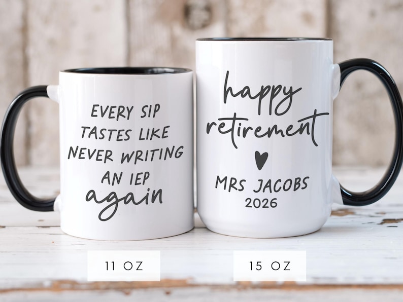 May include: Two white ceramic mugs with black handles and rims. One mug reads "EVERY SIP TASTES LIKE NEVER WRITING AN IEP again." The other says "happy retirement MRS JACOBS 2026." One mug is 11 oz, the other is 15 oz.