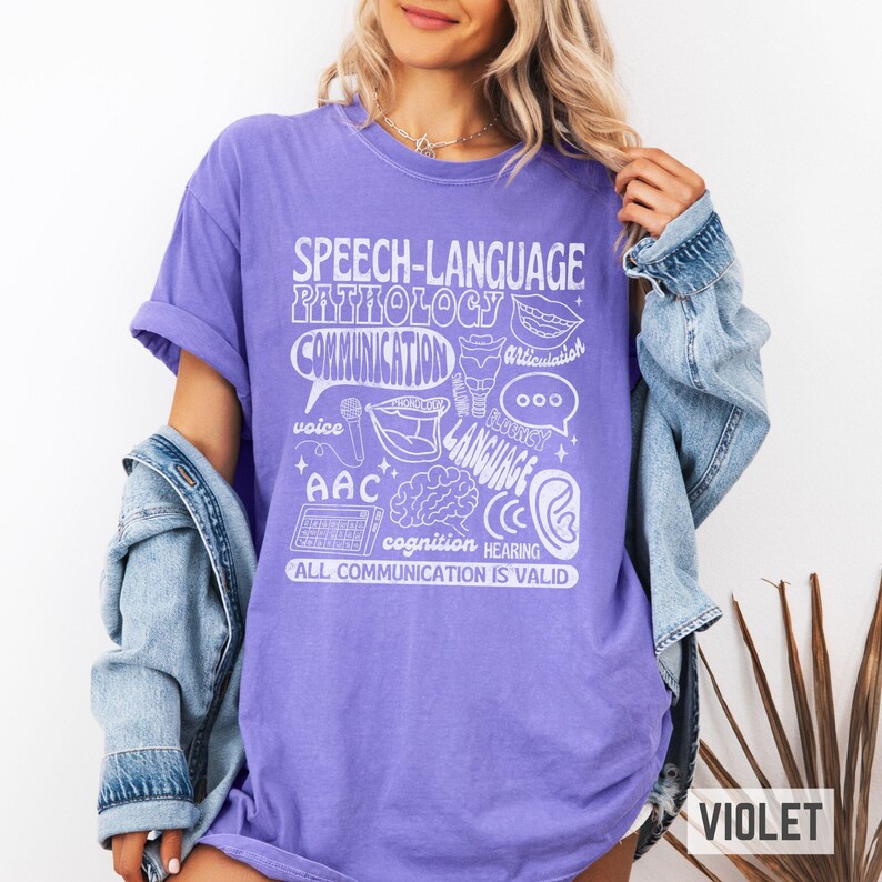 Oversized comfort colors retro-inspired shirt for speech therapist or SLPA with speech therapy scope of practice images on it and the words "All communication is valid." Gift for SLPs.