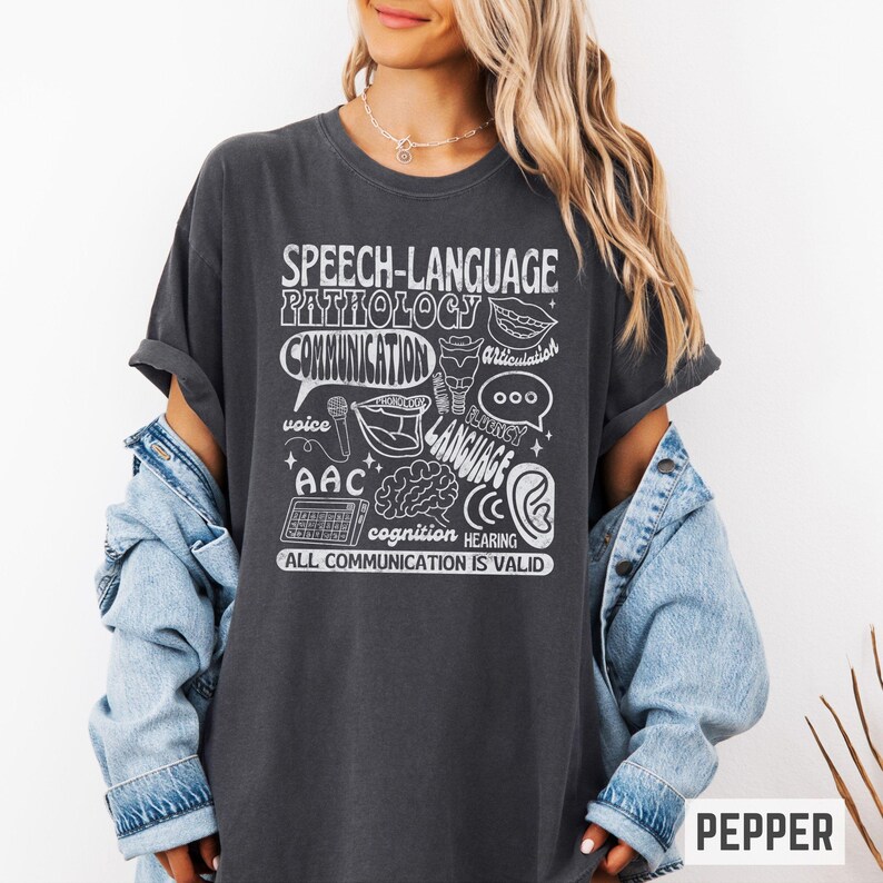 Oversized comfort colors retro-inspired shirt for speech therapist or SLPA with speech therapy scope of practice images on it and the words "All communication is valid." Gift for SLPs.