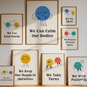 May include: A collection of framed art prints with a cream background and wooden frames. Each print features a cartoon character and a positive message, such as "We Use Kind Words" and "We Can Calm Our Bodies."
