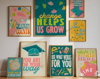 May include: Collection of framed art prints with inspirational quotes and colorful designs. Themes include creativity, growth, and self-improvement. The prints feature text like "Creativity Counts" and "Change Helps Us Grow."
