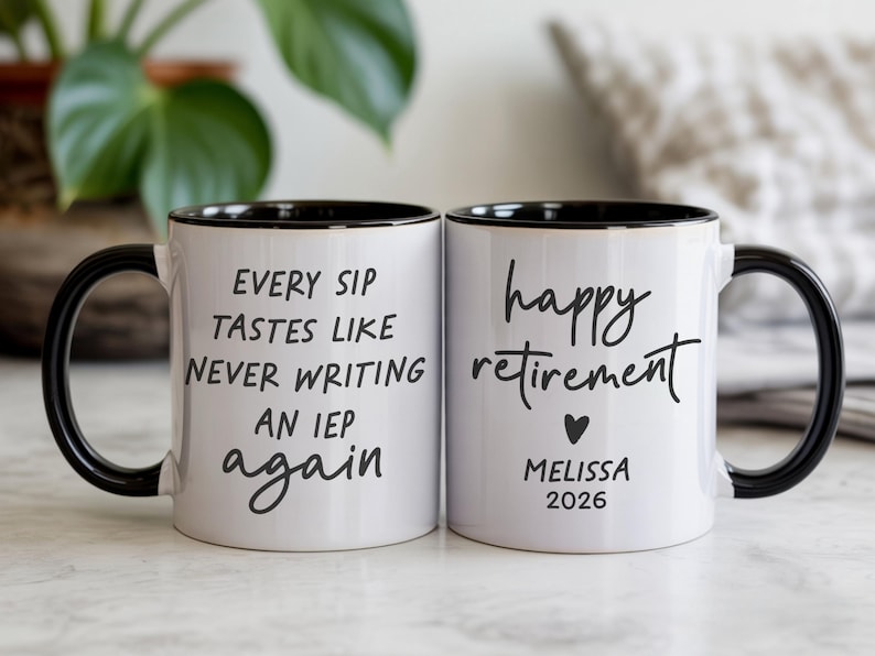 May include: Two white ceramic mugs with black handles and rims. One mug reads "Every sip tastes like never writing an IEP again." The other mug says "happy retirement" with a heart, name, and year.