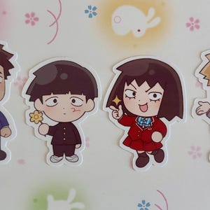 May include: Four cartoon character stickers featuring a man in a suit holding a letter, a boy with brown hair and a flower, a girl with long black hair and a red dress, and a man with blonde hair holding a phone. The stickers are on a pink and white background with a floral pattern.