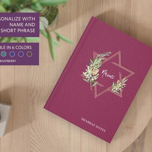May include: A burgundy leather-bound journal with a gold star design and floral accents. The journal says "Naomi" and "Shabbat Notes" on the cover.