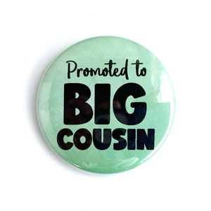 May include: A green button with black text that reads "Promoted to Big Cousin".