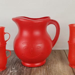 Vintage Kool-Aid Man 2-Quart Red Plastic Pitcher with 4 Matching Cups