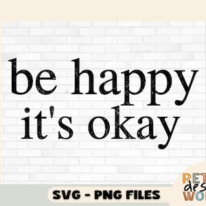 May include: Black and white text on a white brick background that reads "be happy it's okay".