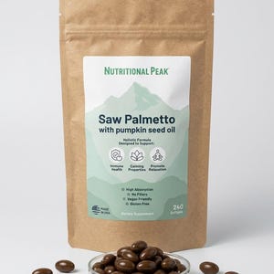 May include: A brown kraft paper pouch of Nutritional Peak Saw Palmetto with pumpkin seed oil dietary supplement. The label features a mountain graphic, text, and icons. A clear glass dish filled with dark brown softgels sits in front of the pouch.