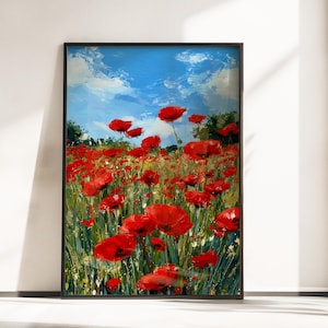 Puede incluir: Impresión artística enmarcada que representa un campo de amapolas rojas bajo un cielo azul brillante con nubes blancas. La pintura tiene un estilo texturizado e impresionista, con pinceladas visibles. La obra de arte está enmarcada en negro.