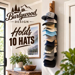 May include: A vertical wooden wall-mounted rack holding ten baseball caps in a stacked arrangement. The rack features the text Burlywood DESIGN and Holds 10 HATS. The hats are in various colors including grey, tan, blue, green, and black.