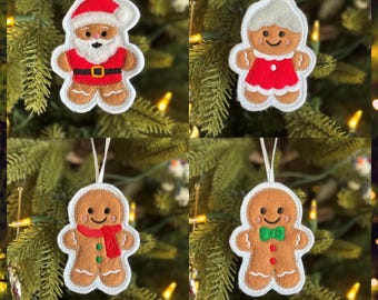 May include: A set of four embroidered felt ornaments featuring a gingerbread person design. One wears a Santa hat and suit, one a red dress with white trim, one a red scarf, and one a green bow tie. Each has a white hanging loop attached.