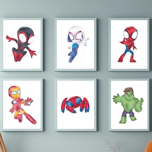 May include: Six framed prints featuring cartoon superheroes. The prints feature Spider-Man, Iron Man, Hulk, and other characters in various poses. The prints are all in a white frame with a white mount.