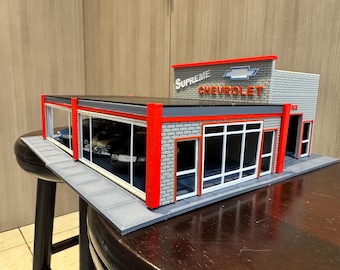 Concesionario de coches a escala O