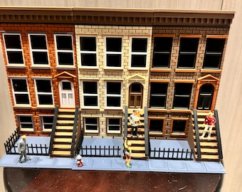 Colección de casas adosadas de piedra rojiza a escala O KITS