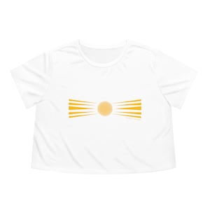 May include: White cropped t-shirt featuring a yellow sunburst design and the text "The Sun is in My Blood" in small font.