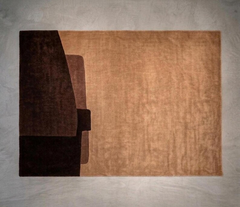 Copper and brown terracotta geometric rug variant, dense plush wool, subtle high low carving detail