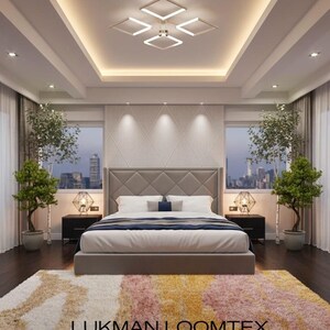 Master bedroom, hand tufted wool shag rug at bed foot, warm mid century modern abstract horizon tones, thick plush pile