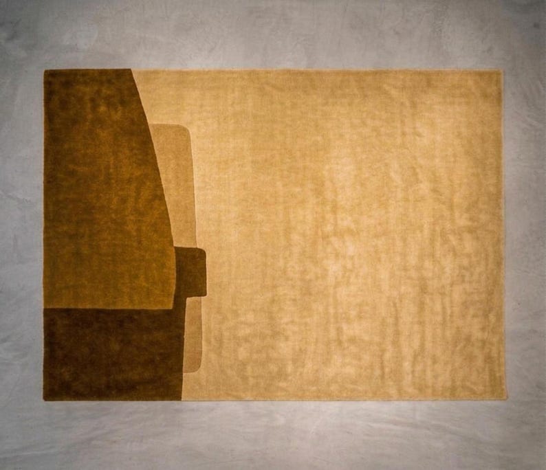 Warm mustard and gold colorway, modern wool area rug with minimalist geometric block composition