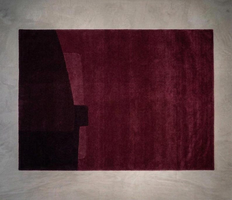 Deep burgundy modern wool area rug, rich color block design, luxe hand tufted texture and pile