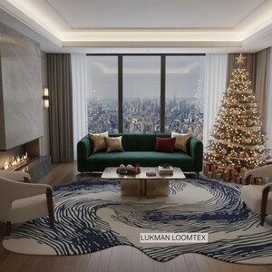 May include: A decorated Christmas tree stands in a living room with a green sofa and a patterned rug. The rug features a blue and white wave design. A fireplace and city view are also visible.