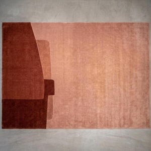 Soft blush terracotta modern wool area rug, muted peach blocks, hand tufted plush pile and carving