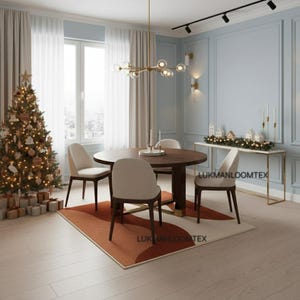 May include: A dining room scene featuring a round wooden table with four beige chairs. A Christmas tree is decorated with lights and ornaments. A patterned rug in shades of orange and beige sits beneath the table. The room has light blue walls and a gold chandelier.