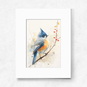 May include: Watercolor painting of a bluebird perched on a branch with red berries. The bird has a blue head and wings, a white belly, and an orange breast. The background is a soft watercolor wash of light blue and brown.
