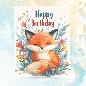 May include: A watercolor illustration of a happy fox with closed eyes, surrounded by colorful flowers and greenery. The text "Happy Birthday" is written in red above the fox.