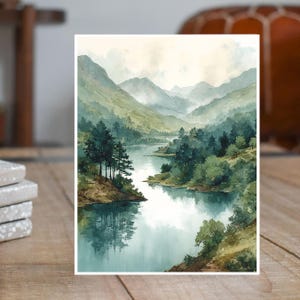 May include: Watercolor painting of a serene mountain lake scene. The artwork features lush green trees, rolling hills, and a calm body of water reflecting the sky. The color palette includes shades of green, blue, and brown, creating a peaceful landscape.