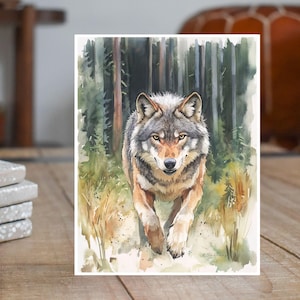 May include: A watercolor painting of a wolf walking through a forest. The wolf is gray and brown with a white chest and a black nose. The forest is green and brown with tall trees.