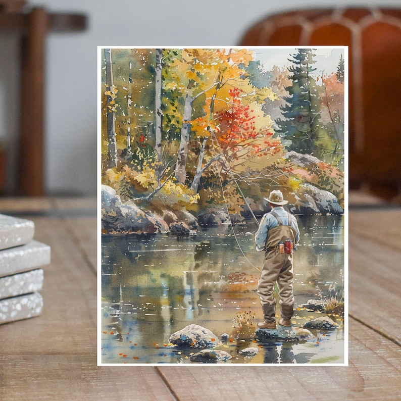 May include: A watercolor painting of a man fly fishing in a river. The man is wearing a hat and a fishing vest. The river is surrounded by trees with fall foliage.