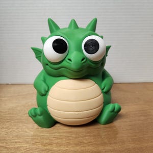 Dino Piggy Bank – Googly Eyes & Adorable Charm!