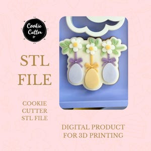 Könnte beinhalten: Ein Oster-Ausstecher-Design mit drei hängenden Eiern in Pastellfarben, verziert mit Blumen und Schleifen. Das Bild enthält den Text "STL FILE" und "DIGITAL PRODUCT FOR 3D PRINTING."
